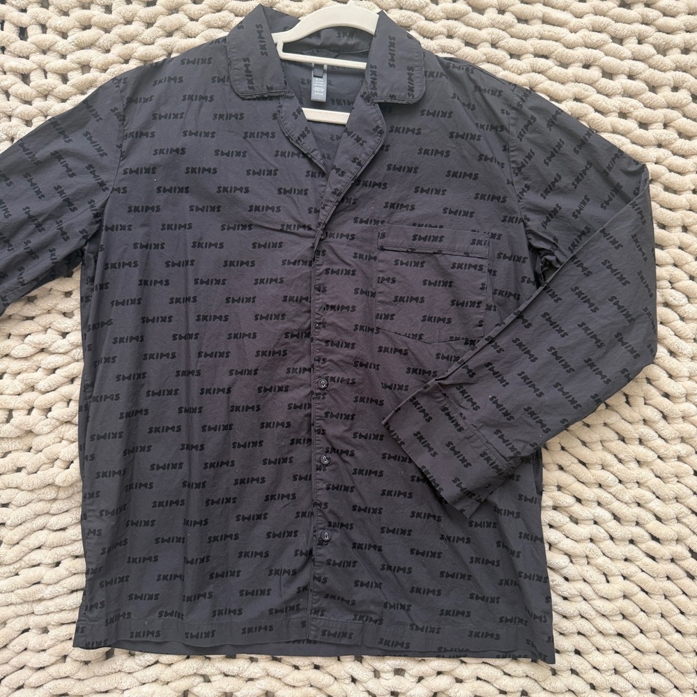 SKIMS Jacquard Long Sleeve Button Up Sleep Shirt in the color Onyx